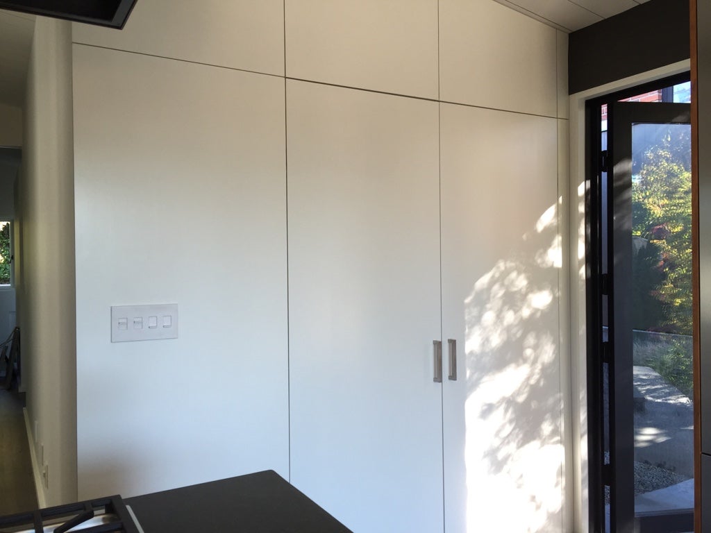 Hand painting slab doors with Advance Professional Painting