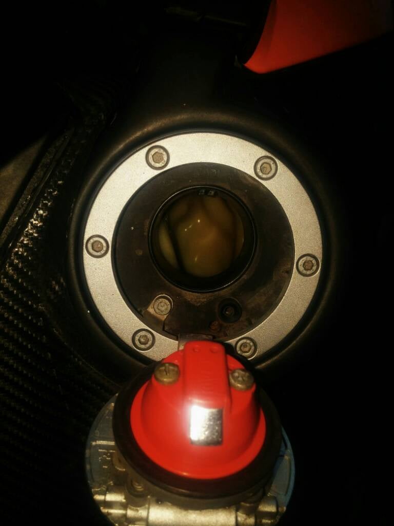 950/990 key snapped inside the gas cap, open the gas cap without key