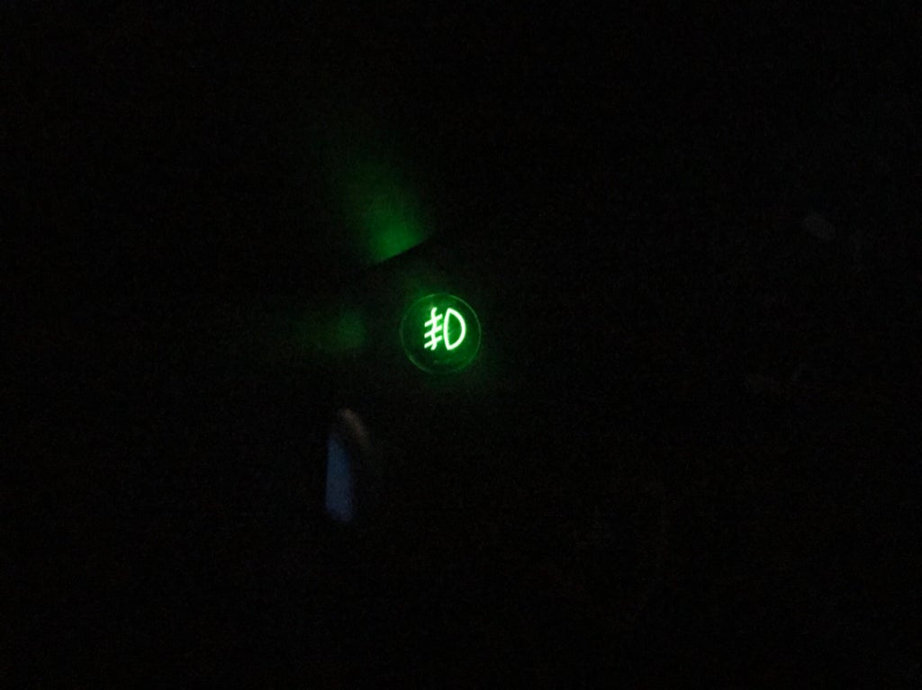 Green fog light staying on when ignition off?
