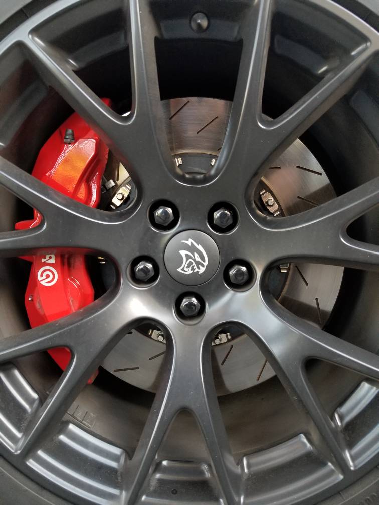 Stoptech/Powerstop brake pads eating up stock brake rotors? SRT