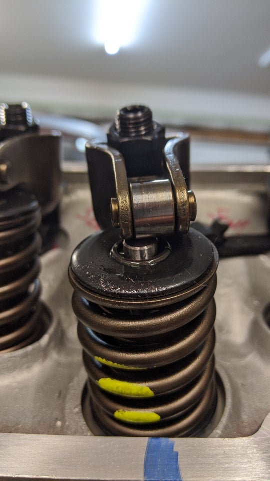 Roller tip of this rocker doesn't sit fully on the end of the valve ...