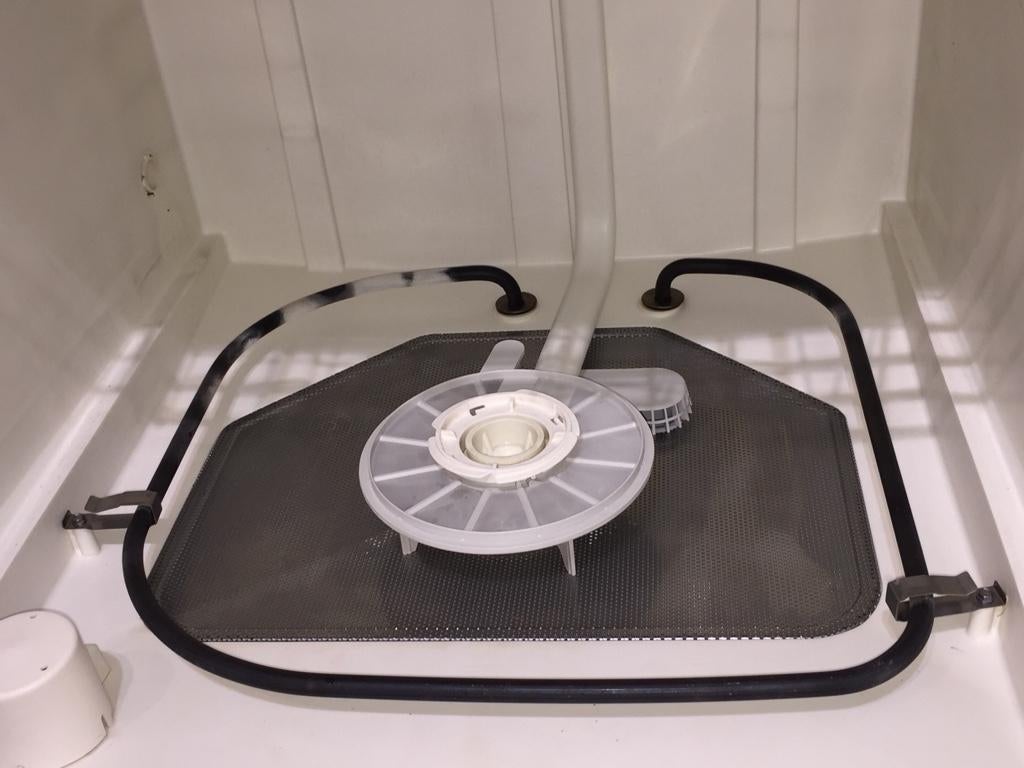 Thick hard water deposits on section of dishwasher heating element DIY Home Improvement Forum