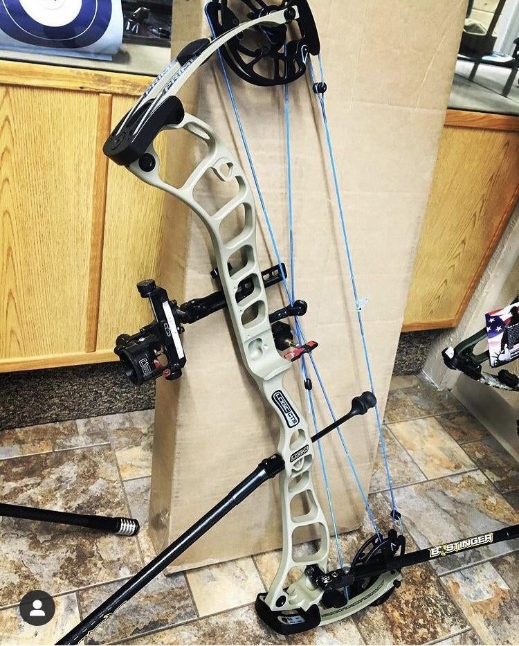 Tan risers with custom strings | Archery Talk Forum