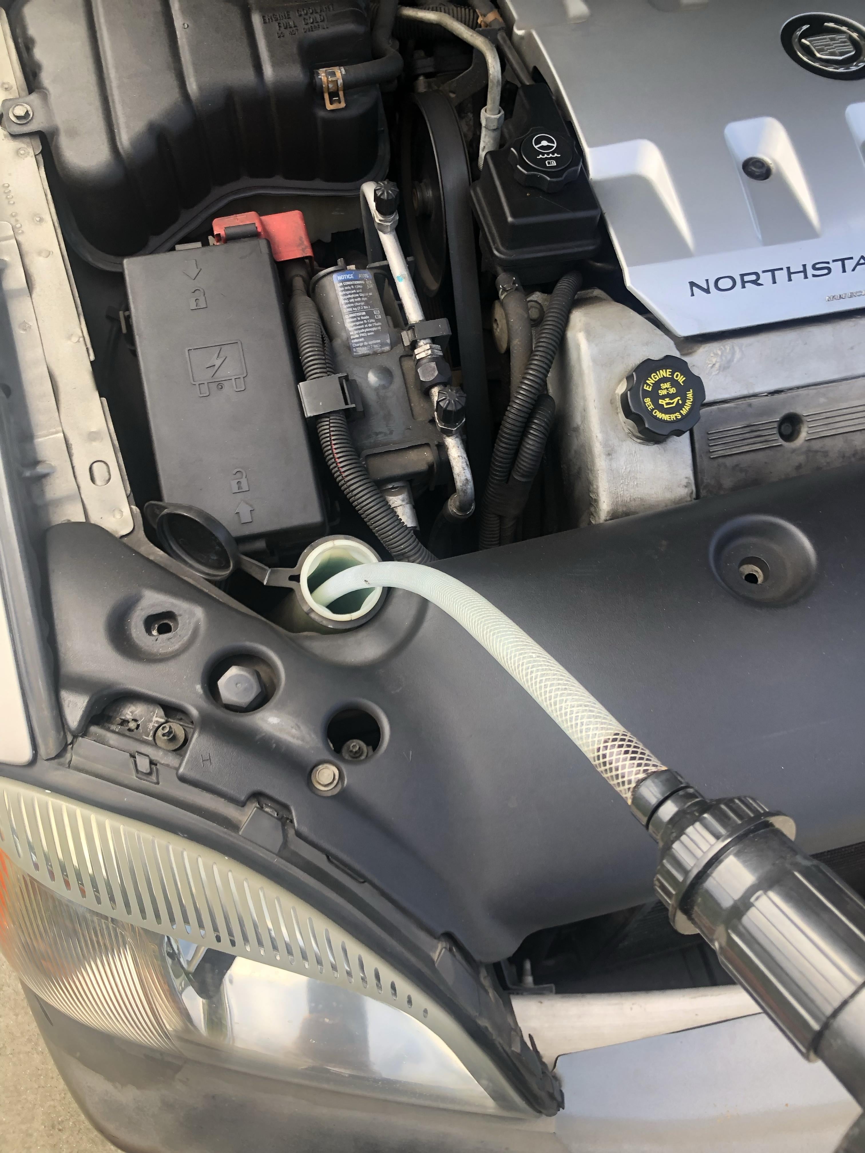 Coolant In overflow tank Cadillac Owners Forum